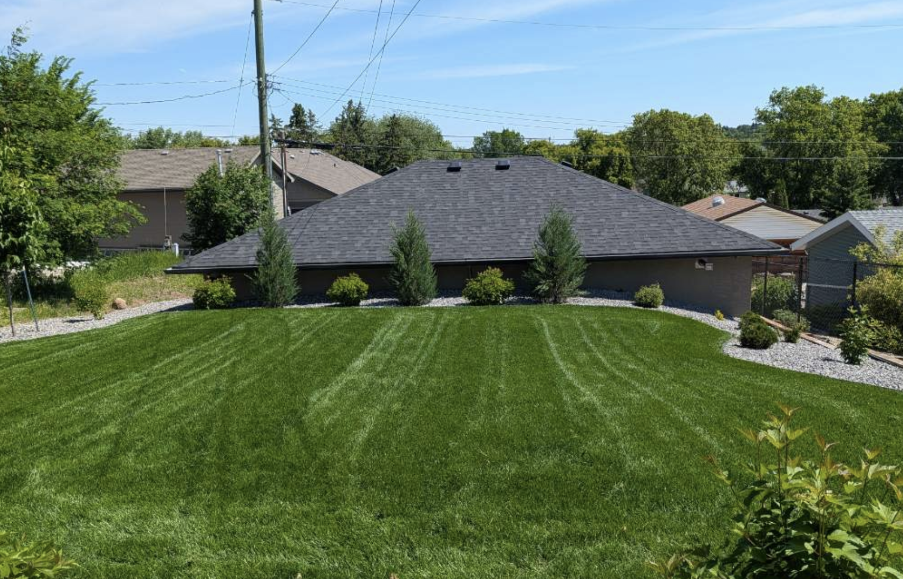 Stripe-mowed residential lawn — Going Yard Edmonton